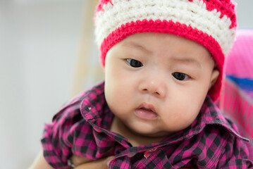 close up of cute asia baby, asia baby boy, happy baby at home