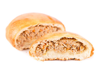 Baked patty with meat on a white background