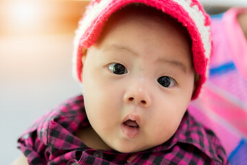 close up of cute asia baby, asia baby boy, happy baby at home