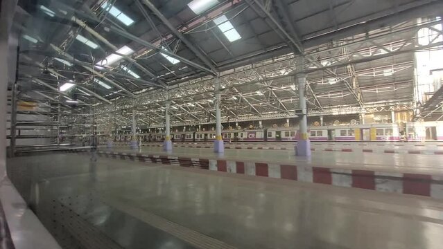 Mumbai AC local arriving CSMT railway station.