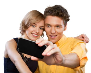 Cute young couple using smart phone isolated on white background