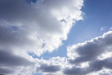 Dramatic blue sky and gray gloomy clouds