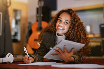 Black woman, portrait smile and tablet writing music in studio for audio track, content creation or...