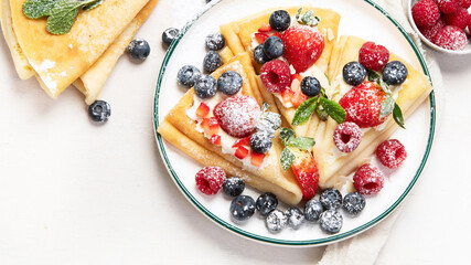 Healthy breakfast, homemade traditional crepes or pancakes