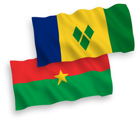 Flags of Saint Vincent and the Grenadines and Burkina Faso on a white background