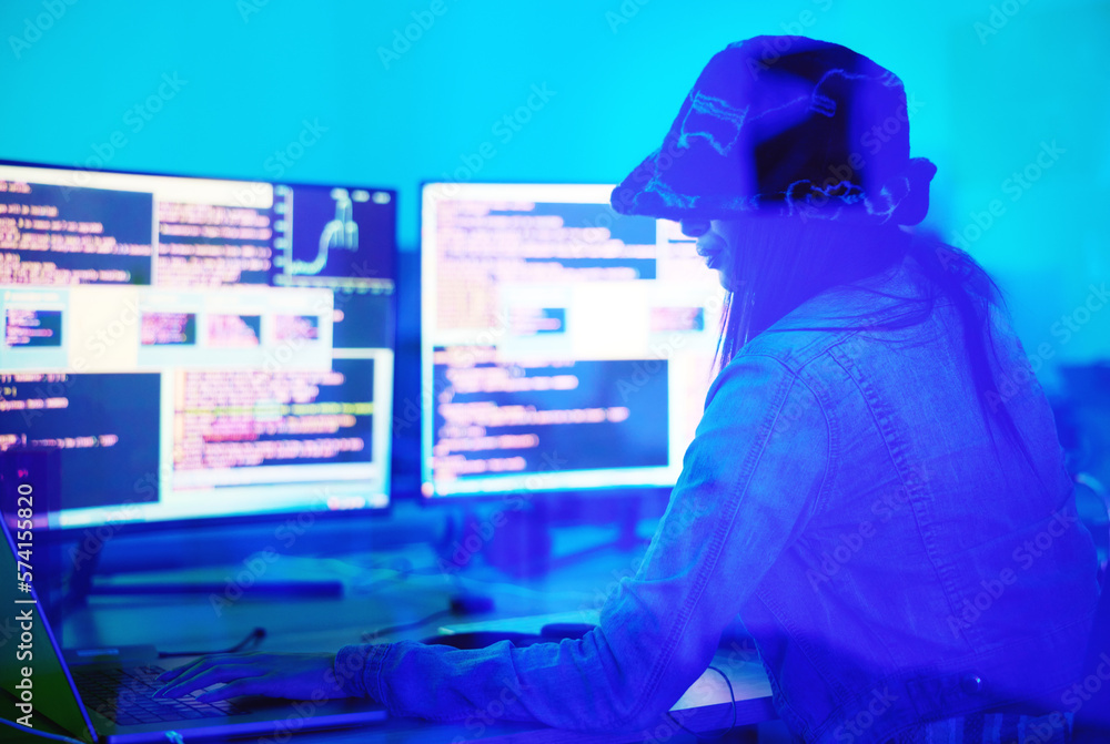 Leinwandbilder Hacker, programmer and woman typing on laptop in home at night in neon light to hack software. Cybersecurity, ransomware phishing and female coder coding on computer for hacking database with malware