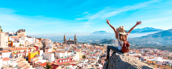 Woman tourist at Jaen, looking at panoramic view of the cathedral- Spain - obrazy, fototapety, plakaty