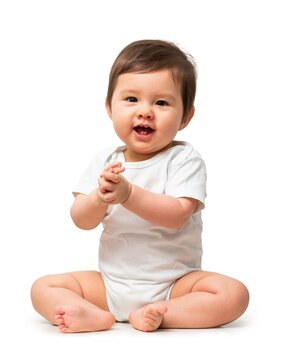 Cute baby in white onesie on white background