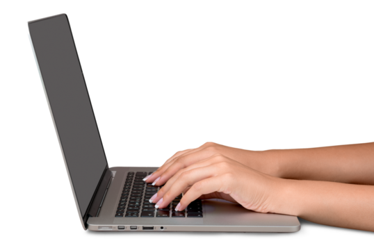 Hands typing on keyboard on modern laptop