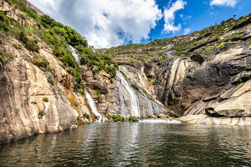 Fototapeta na wymiar Ezaro waterfall, Galicia, Northern Spain in Spring. It empties into the Atlantic ocean in a waterfall