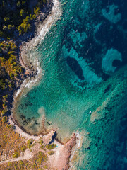 A topdown aerial view of a small cove