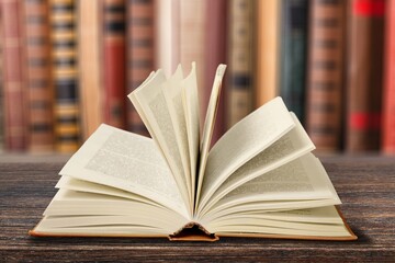 Open Holy Bible book on the desk