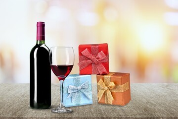 Tasty wine and gift. Valentine's Day concept