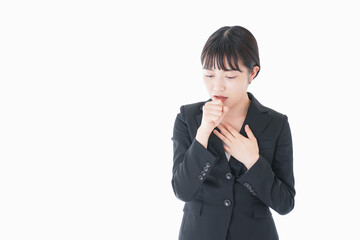 風邪をひいた若いビジネスウーマン