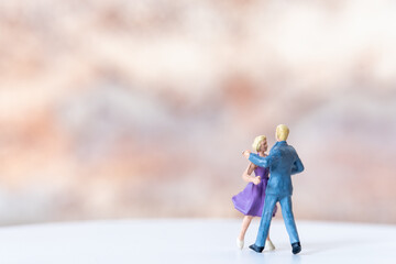 Miniature Couple dancing on dance floor , International dance day concept