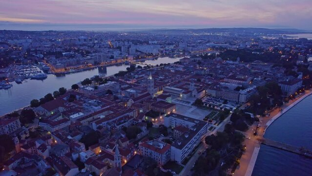 Zadar city in Croatia before sunrise with city lights still on, aerial