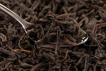 Black tea in a spoon