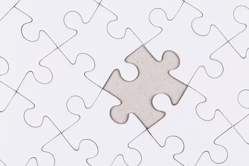 white puzzle jigsaw close up