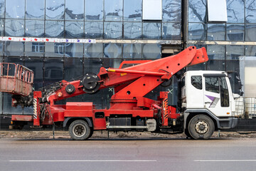 truck with a crane for the construction of houses and business centers