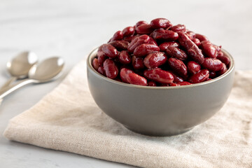 Red Organic Kidney Beans in brine. Close-up.