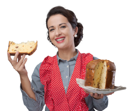 Woman in apron eating panettone
