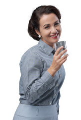 Smiling woman drinking a glass of water