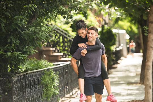 Couple Walking Home After Workout