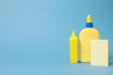 Concept of different office stationery with glue