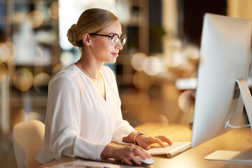 Serious, research and woman on a computer for email, software development and programming. Web...