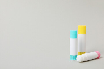 Concept of different office stationery with glue