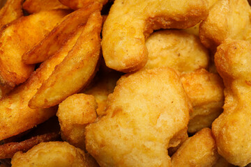 Concept of tasty fast or junk food, nuggets