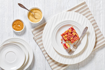 Raspberry Crumble Bars on white plate, top view