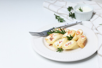 Concept of tasty food, thin pancakes with filling, space for text