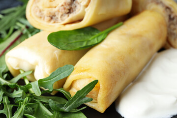 Concept of tasty food, thin pancakes with filling