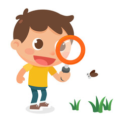 A child uses a magnifying glass to looking a bug.