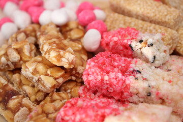 Close up view of Chinese sweetmeat made of many ingredients (called Kanom Chan ap in Thai) for offer Sacrifices to god in Chinese culture.