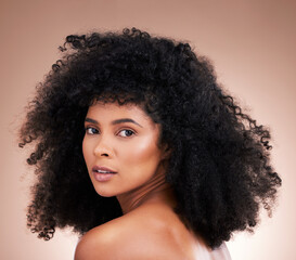 Hair, face and beauty with black woman in portrait, skin and natural cosmetics with glow on studio...