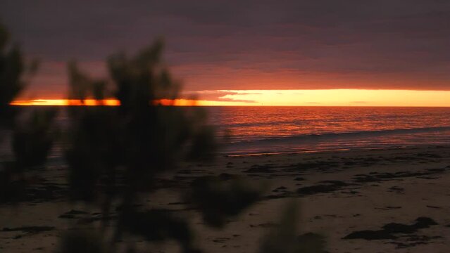 Sunset over Ocean during Sunset on Beach in Afternoon Sunset and Sea