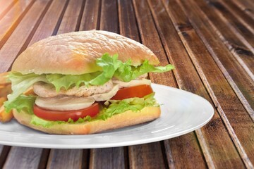 Tasty fresh sandwich with cheese and vegetables