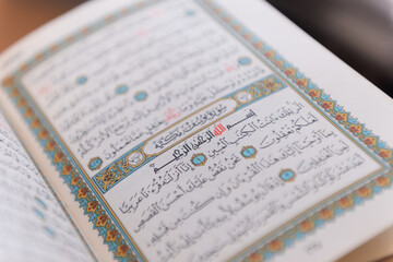 Sarajevo, Bosnia and Herzegovina, 20th february 2023; Muslim beads and Koran or Qoran on wooden...