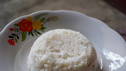 Cooked rice. Close up of white rice on a plate.