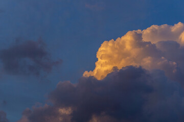 Fototapeta na wymiar Beautiful golden hour sky. yellow sunlight clouds at sunset time.