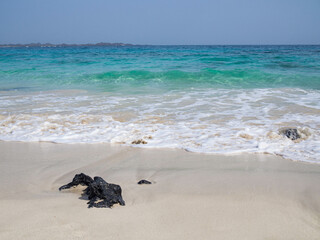 beach with white sand and waves