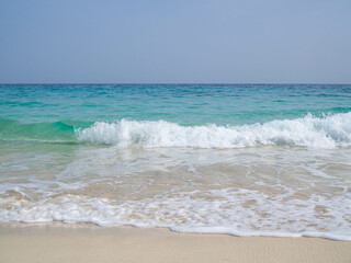 beach with white sand and waves