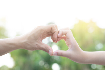 Portrait of two people in the shape of a love heart.