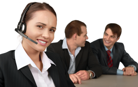 Businesswoman with Headset and Talking Collaborators in Background - Isolated