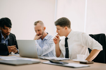Creative managers crew working with new startup project in modern office. Team brainstorming.