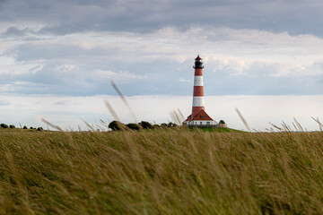 Fototapeta na wymiar Der Westerhever Leuchtturm an der Nordsee in Deutschland