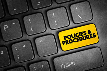 Policies And Procedure text button on keyboard, concept background
