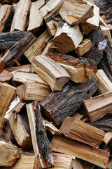 Axed wooden blocks. Blanks for kindling a fireplace and grill. Wooden pattern or background